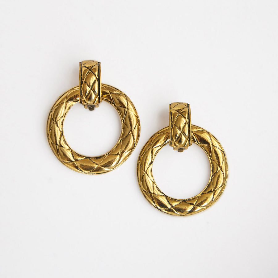 Prima Donna Gold Quilted Clip-on Hoop Earrings.